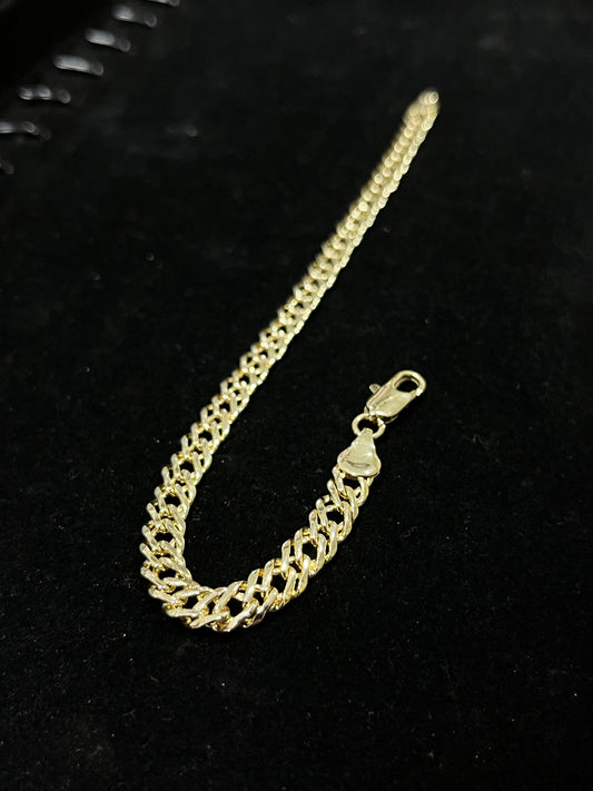 PULSERA TRIPLE GRUMMET